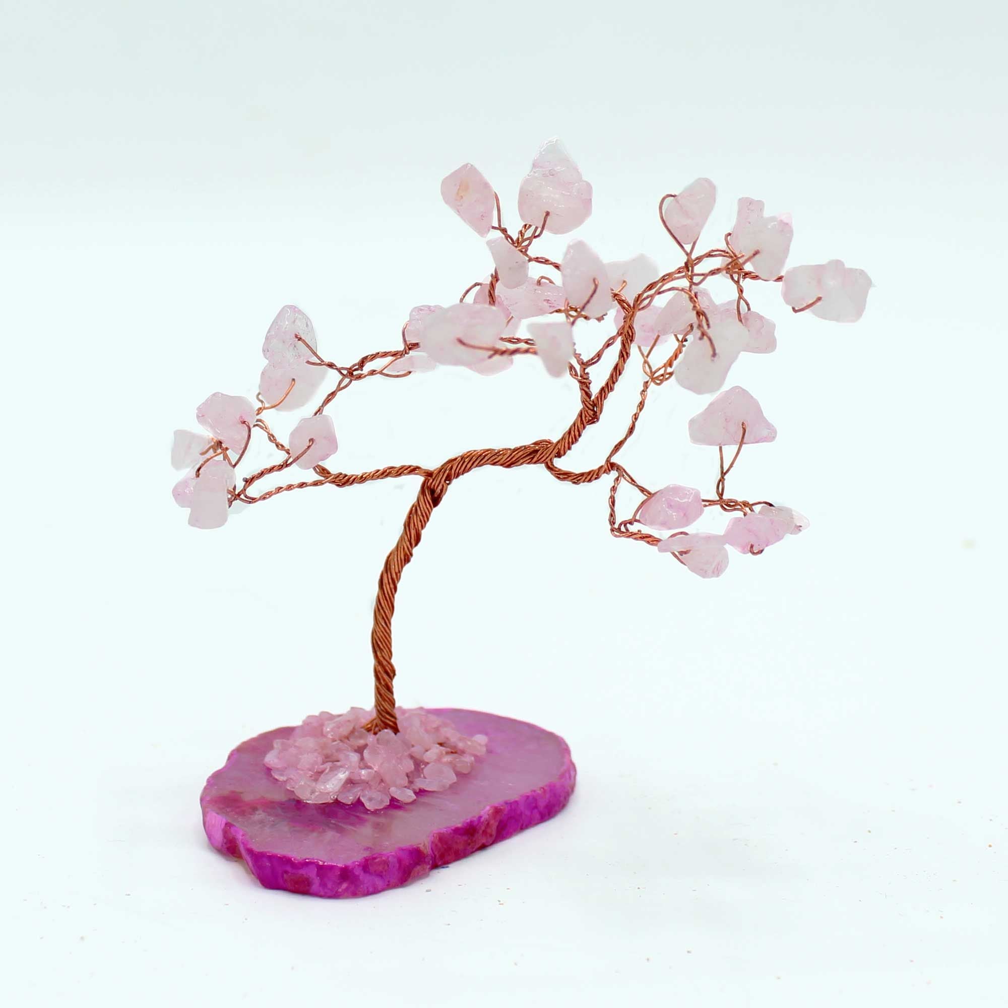 Magisches Edelsteinbäumchen aus Rosenquarz auf rosa Achatbasis