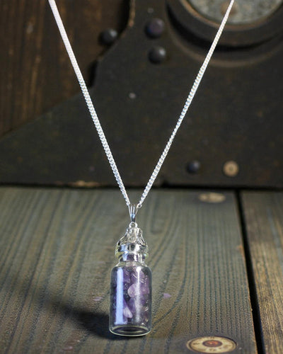 Flasche der Ruhe – Halskette mit Amethyst in einer Phiole